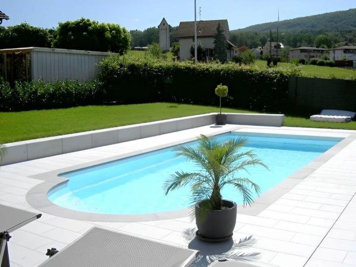 Installation piscine en polyester Montauban